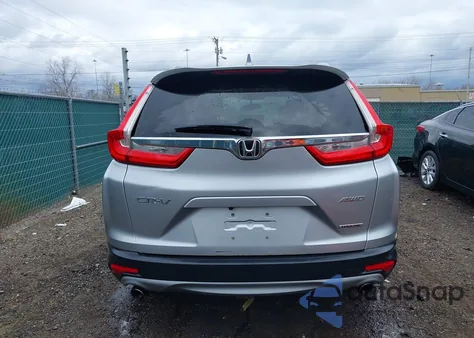 2017 Honda Cr-V Touring z USA, uszkodzony, nr VIN 5J6RW2H96HL019130